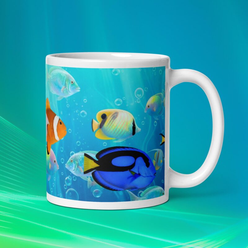 Ceramic mug with colorful ocean fish design on a blue background